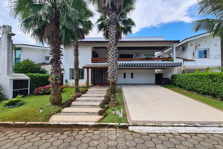 Casa en Jardim Acapulco Guarujá con 5 Suites y Piscina