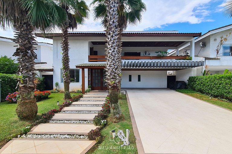 Casa en Jardim Acapulco Guarujá con 5 Suites y Piscina