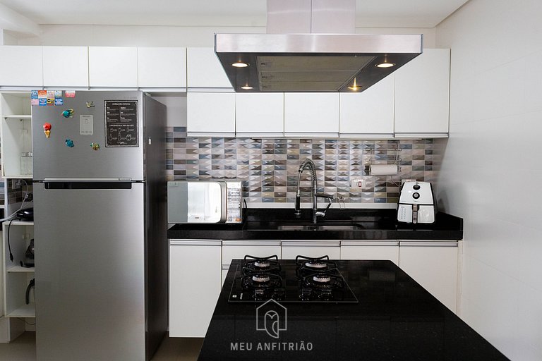 Luxury Beachfront Triplex with Rooftop Pool