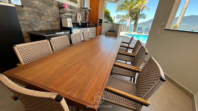 Casa confortável com beach tênis e piscina aquecida