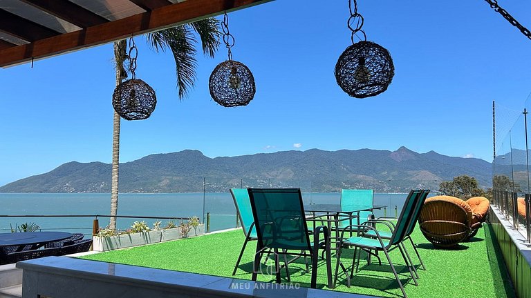 Casa confortável com beach tênis e piscina aquecida
