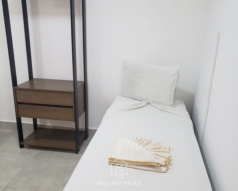 3 pessoas, café, garagem em frente à praia